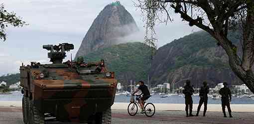 Troops, armored cars and patrol boats protect G20 summit