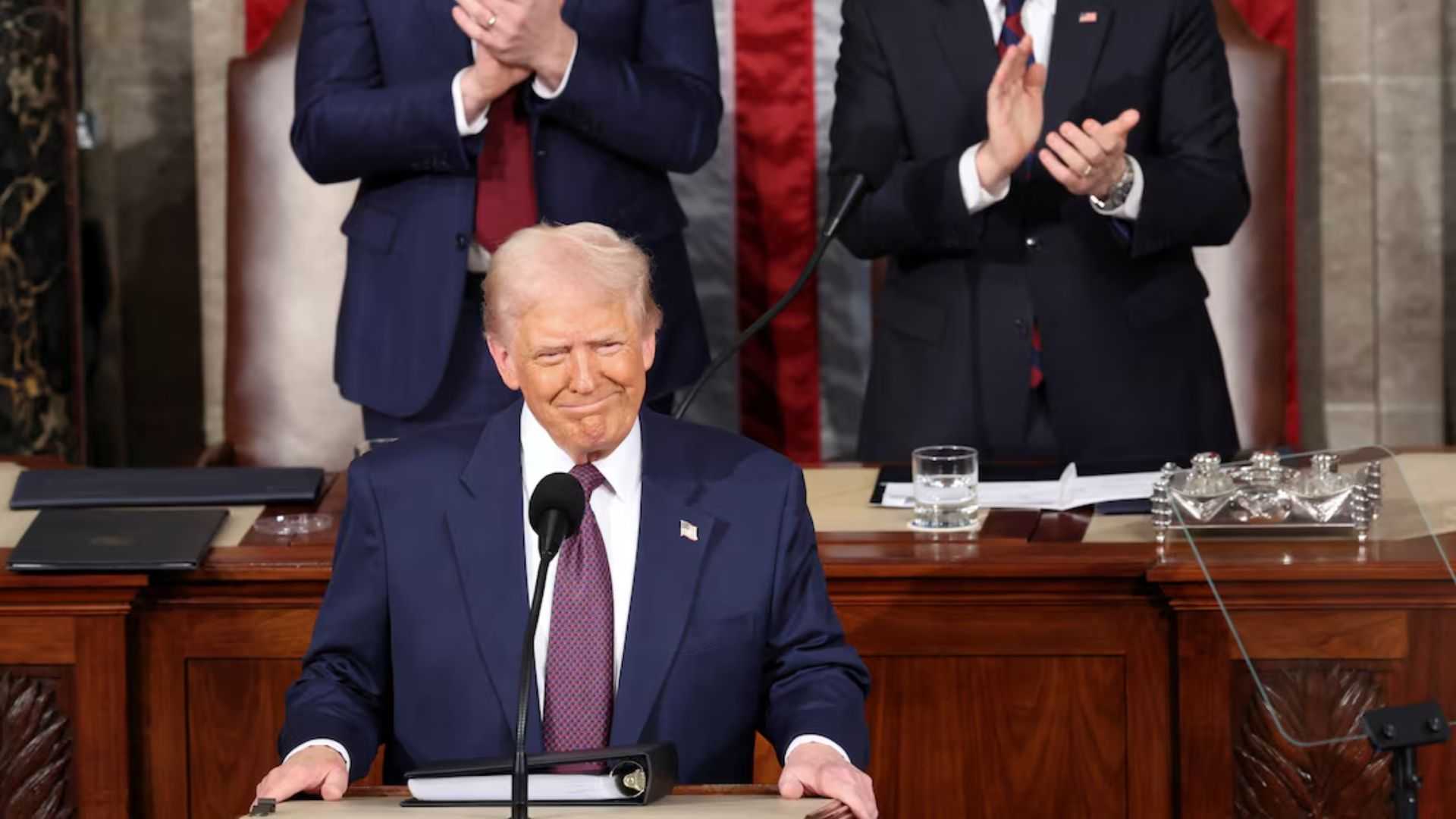 Trump takes victory lap in speech to Congress, Democrats protest