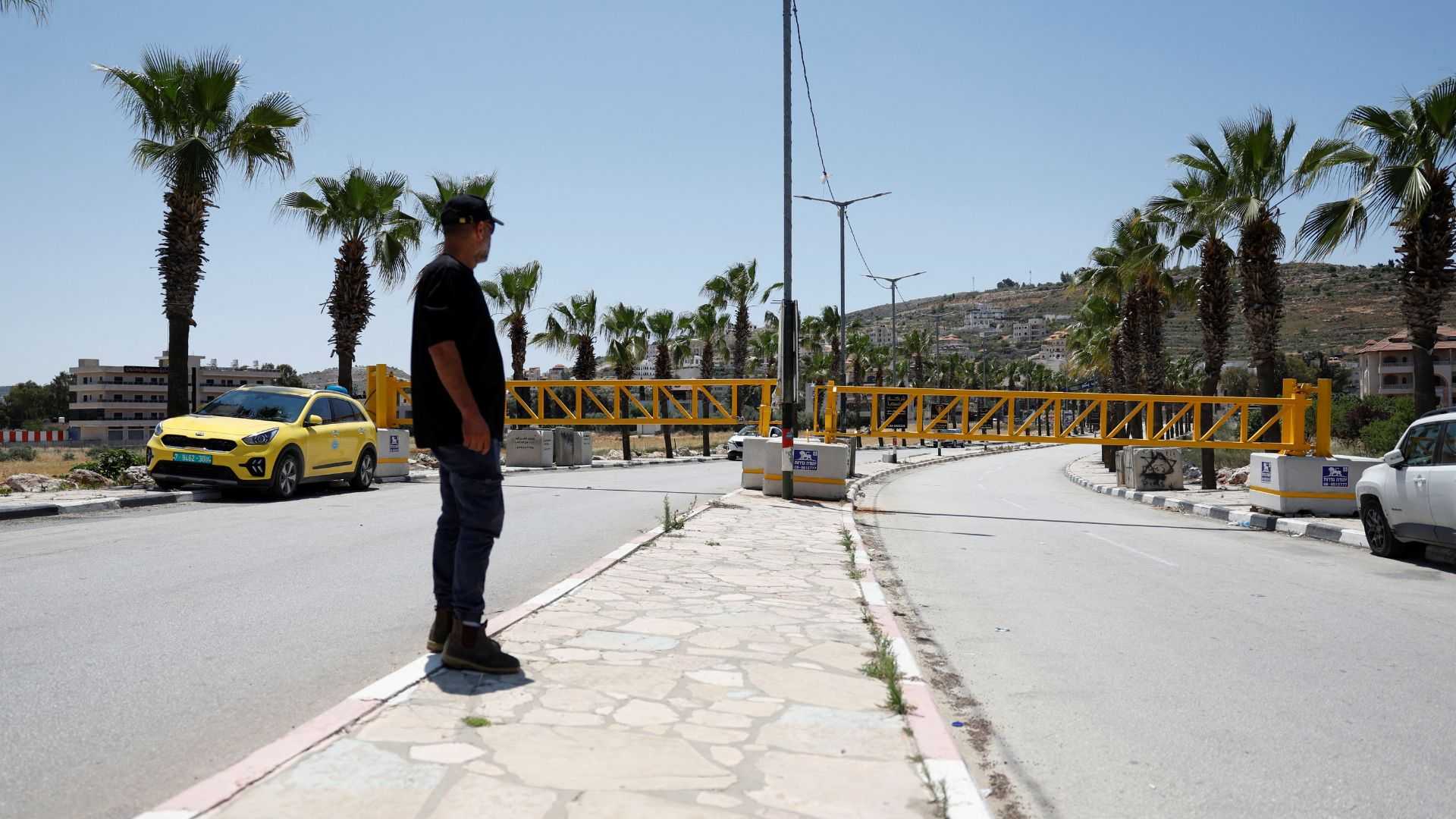 West Bank town becomes 'big prison' as Israel fences it in